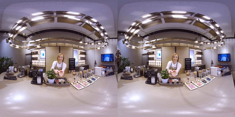 Side-by-side VR180 frame of the Coffee Ambassador at the boutique counter